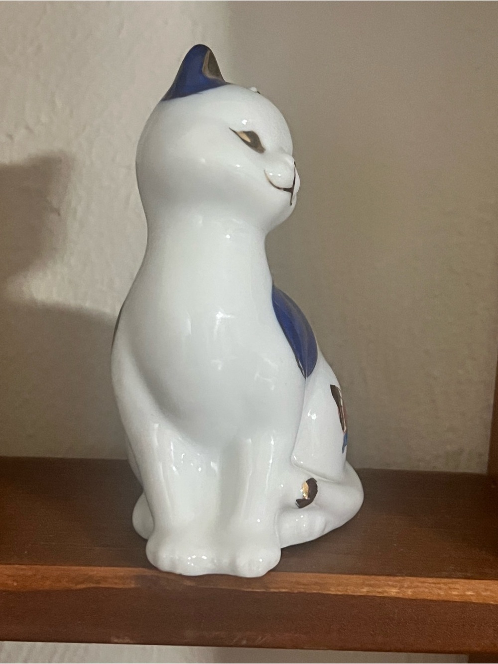 White Ceramic Cat Figurine with Blue Accents and Gold Trim - Picture 4 of 5